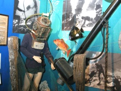 Image 5 - Today, the museum contains artifacts and ephemera covering 4,000 years of diving history. Highlights include an exhibit of dive helmets from around the world, and one dedicated to Upper Keys treasure hunter Art "Silver Bar" McKee.